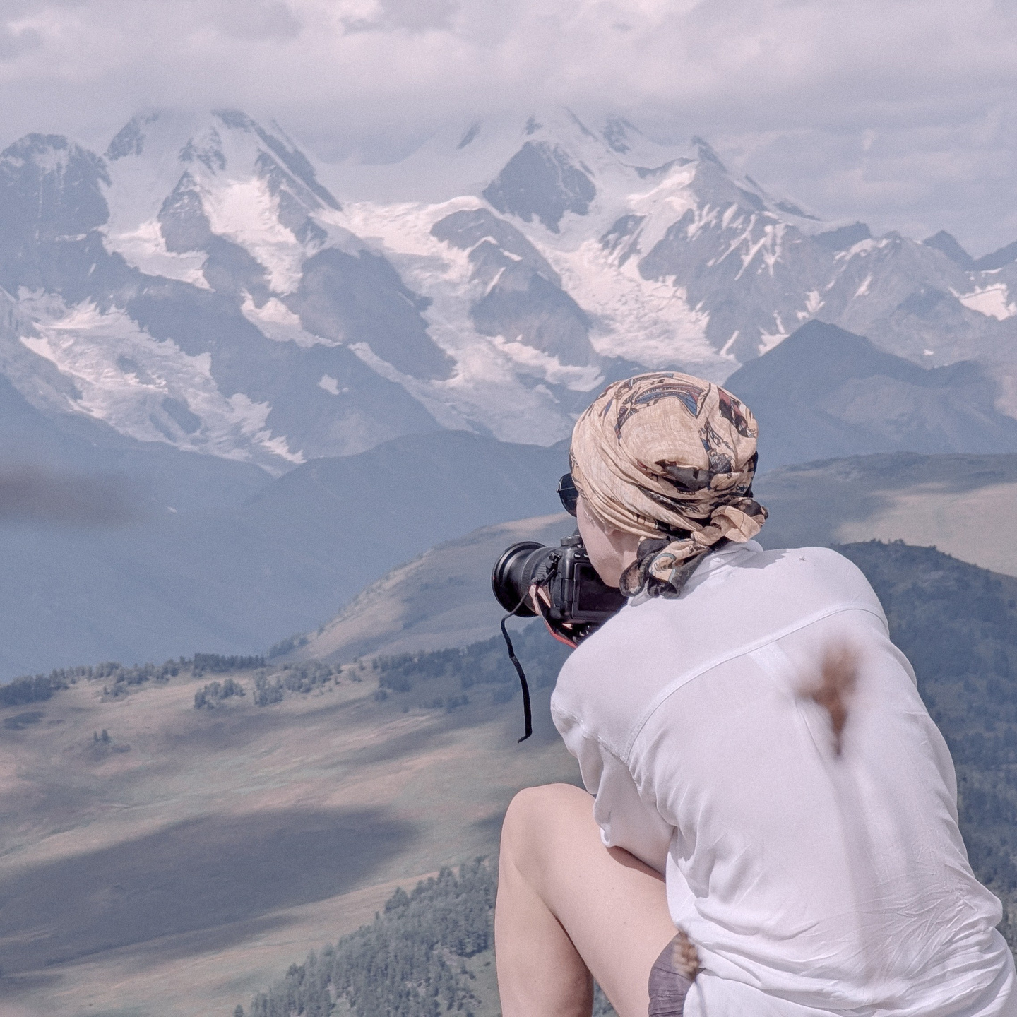 Natalja Poplavska, photographer and visual artist, captured in a natural setting, reflecting Timeless Unity