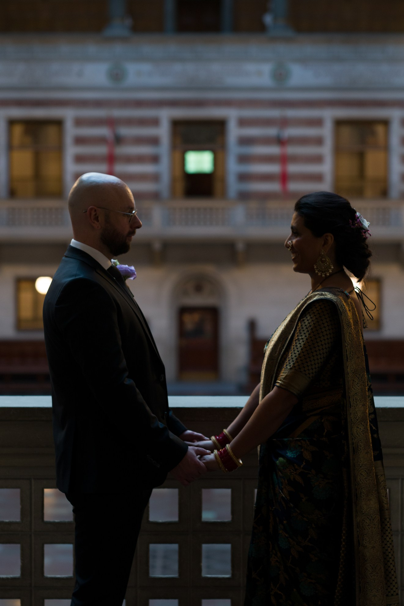 Loving couple sharing a happy moment in Copenhagen City Hall