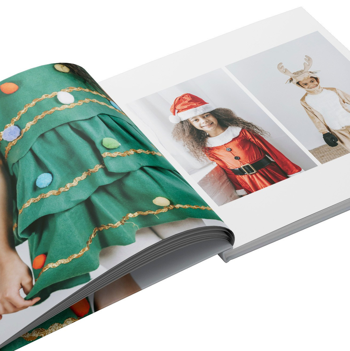 Álbum impreso personalizado con tapa dura, de 26 páginas, que recoge las fotos de las sesiones de Navidad de Rainbox, creando un recuerdo duradero y elegante