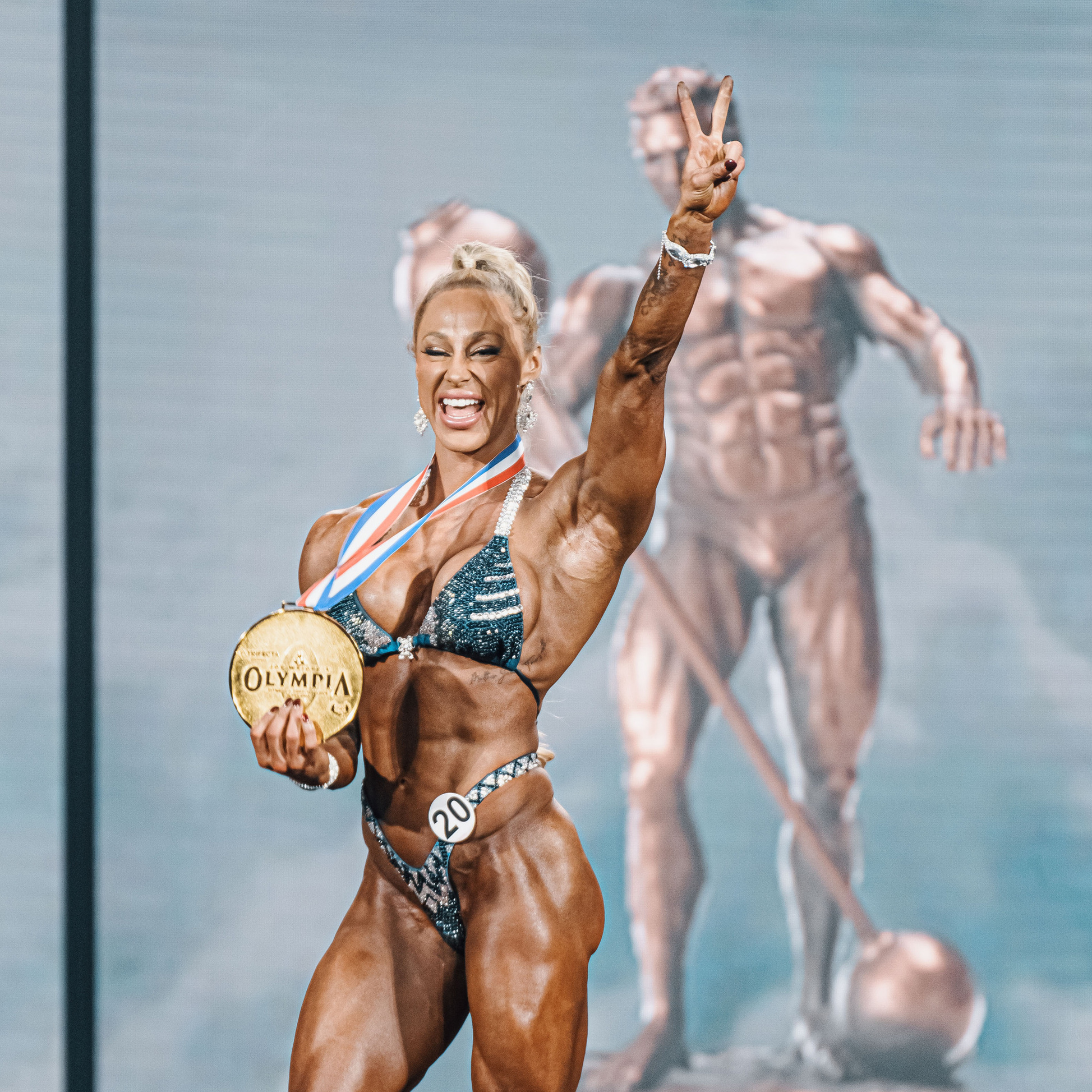 Missy Truscott is the NEW 2022 Fitness Olympia Winner. Truscott wins her second Fitness Olympia title at the 58th edition of the Olympia.