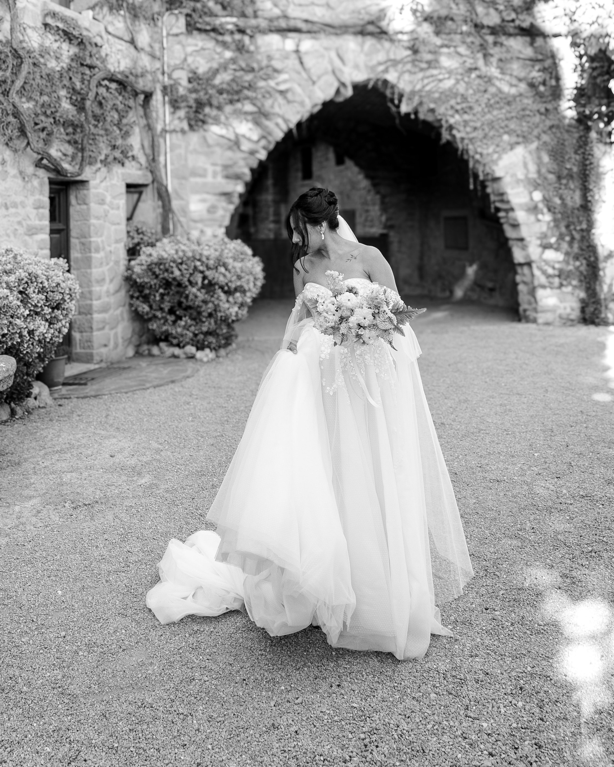 Editorial bridal shot highlighting dress and destination wedding venue in Barcelona