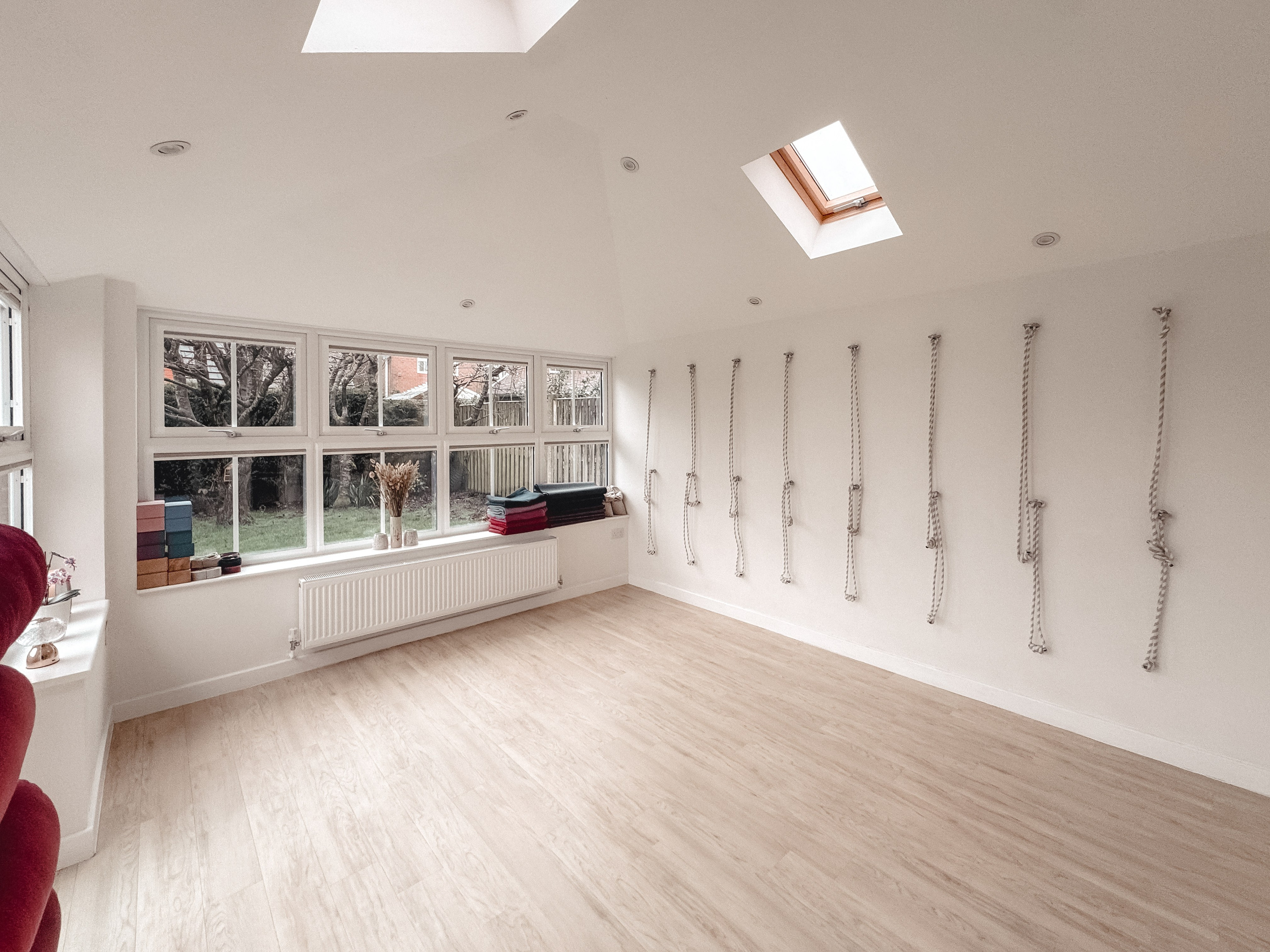 Iyengar yoga studio in Solihull with wall ropes, props, and open practice space for private lessons