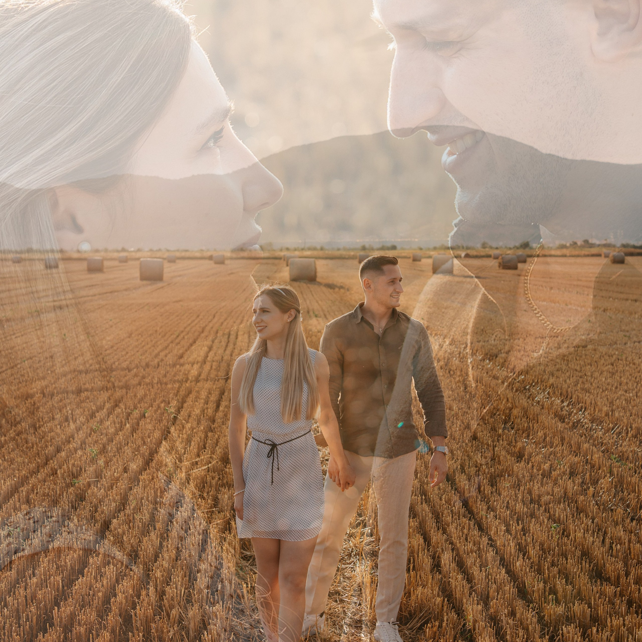 Double-exposure portrait of a couple walking through a golden field