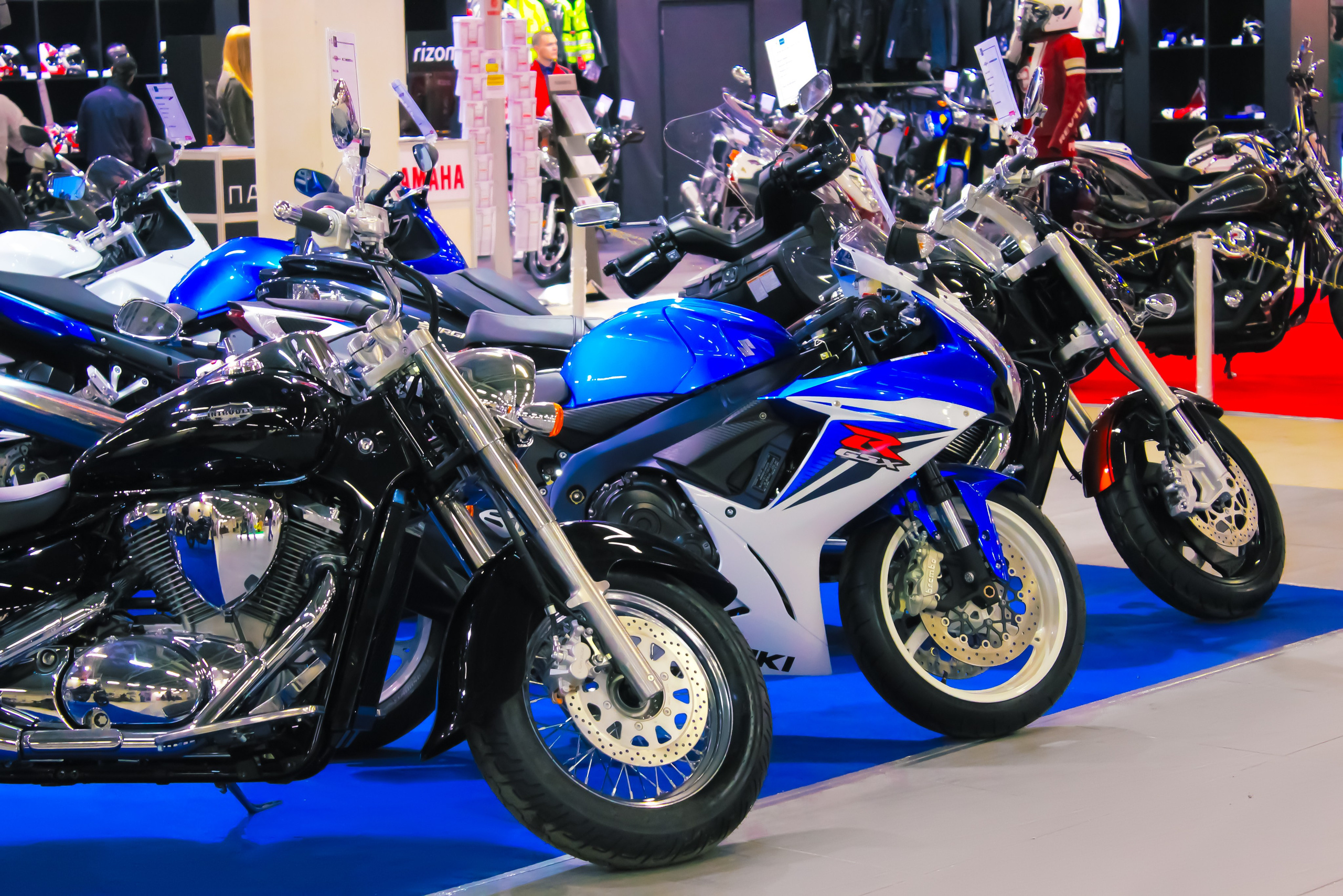 Commercial reportage photo of Studio K20 at a motorcycle exhibition, capturing the event's highlights and atmosphere