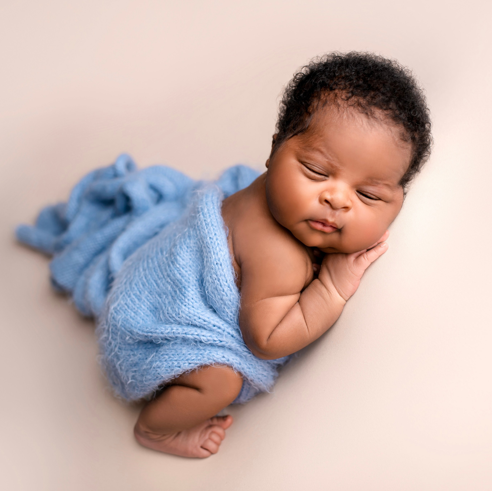 Newborn baby portrait in a professional photography studio in Prague