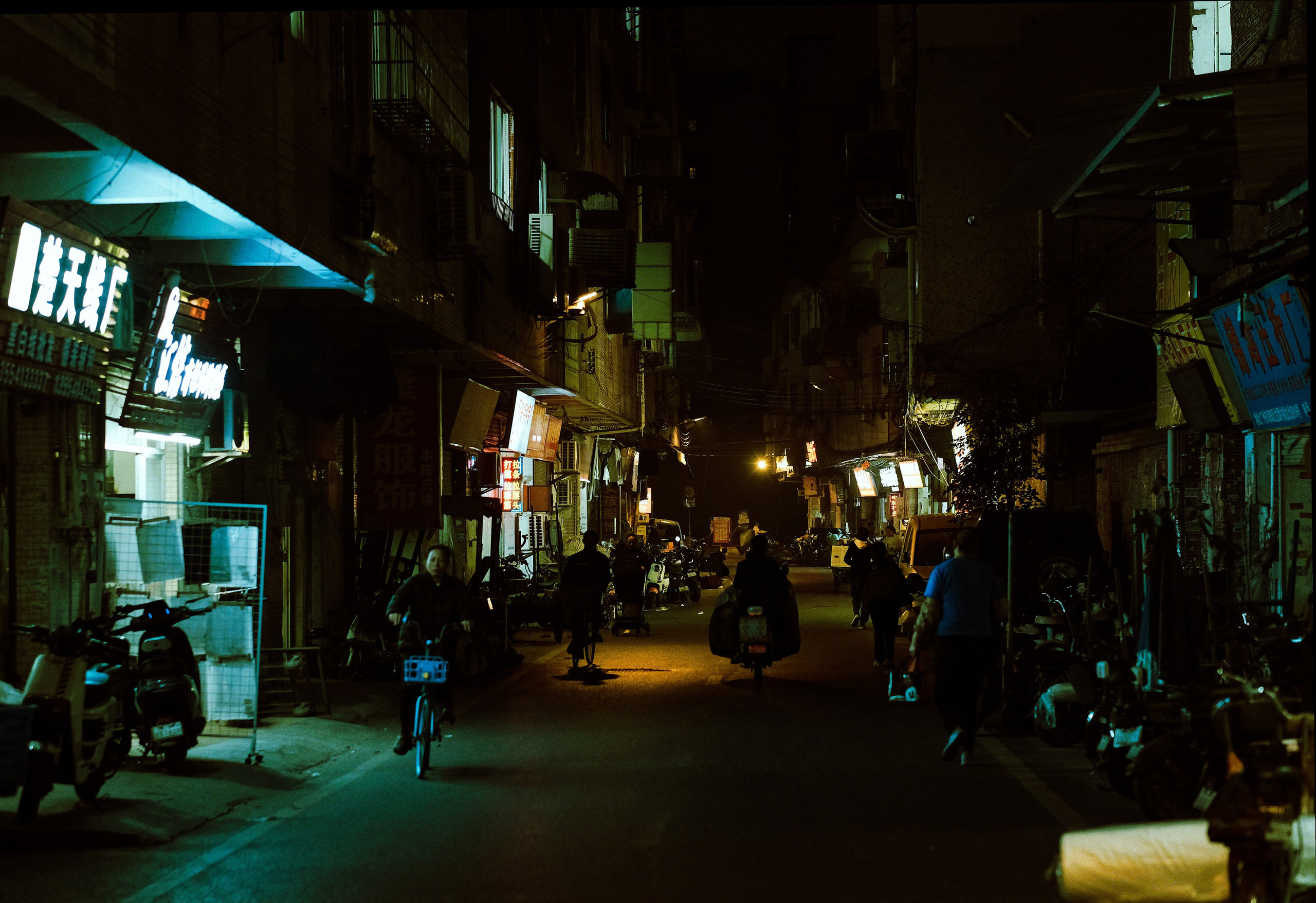 Crowded Night Alley in Guangzhou Near Longtan Station