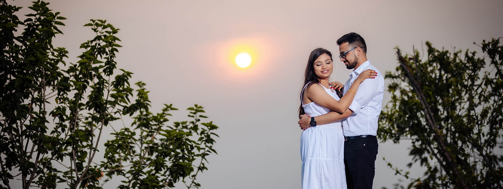 Golden light pre-wedding photoshoot with bride and groom outdoors in Nepal
