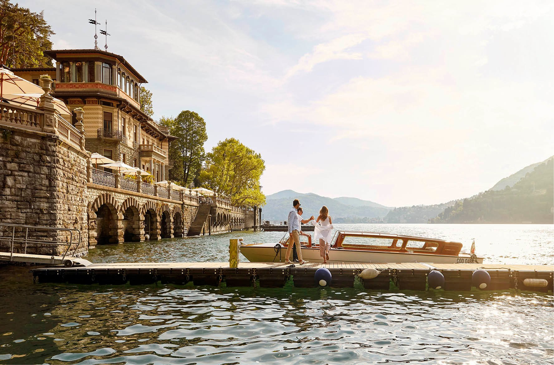Scenic luxury real estate in Lake Como, featuring an elegant terrace with breathtaking lake views, highlighting the power of cinematic property branding.