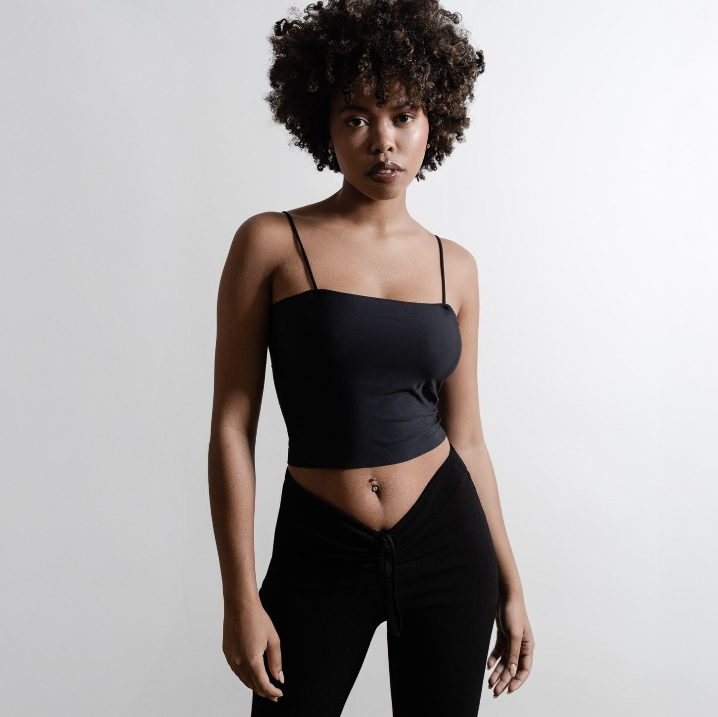 Studio portrait with natural light and clean background