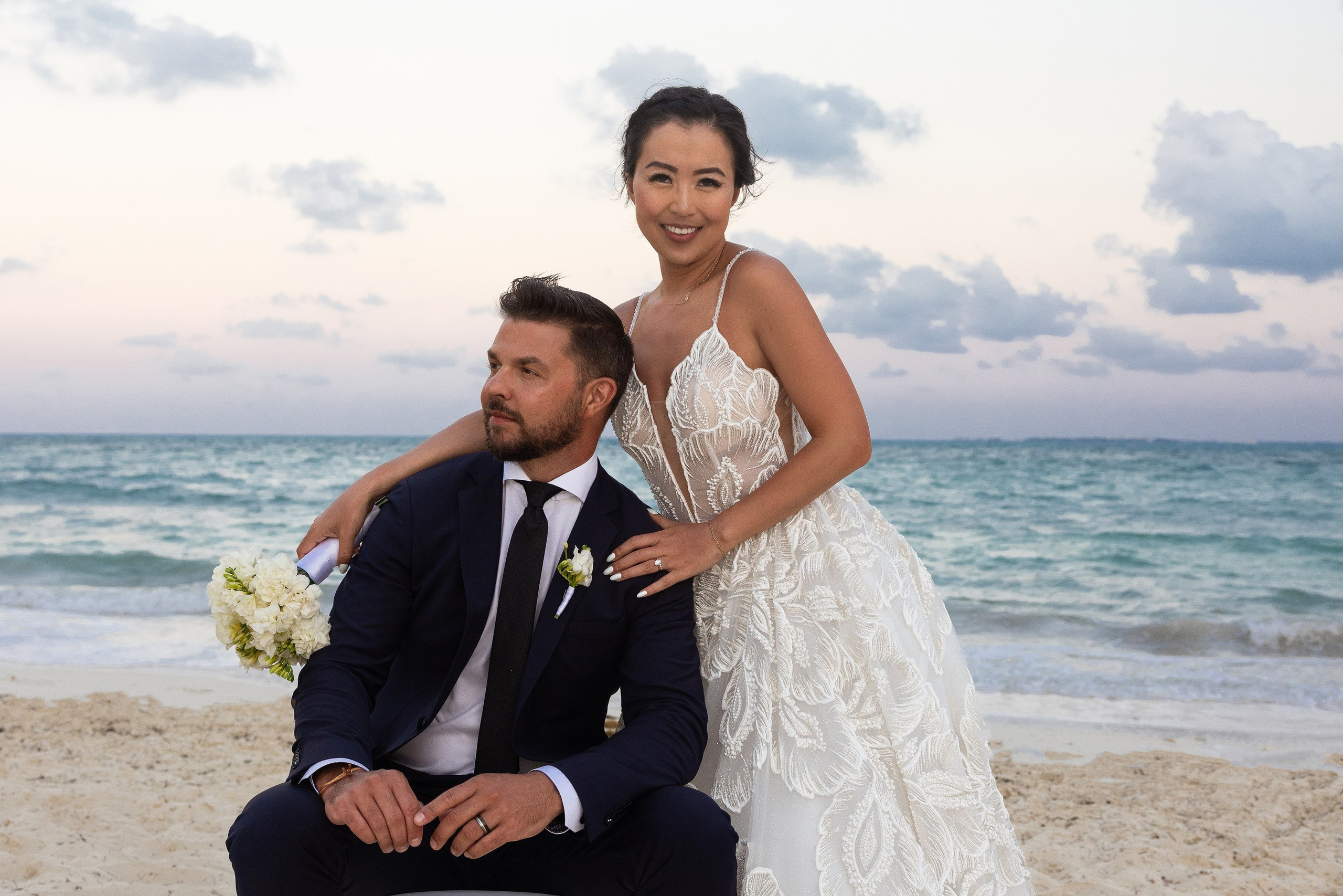 Romantic couple portrait with turquoise Caribbean Sea in the background at Planet Hollywood.