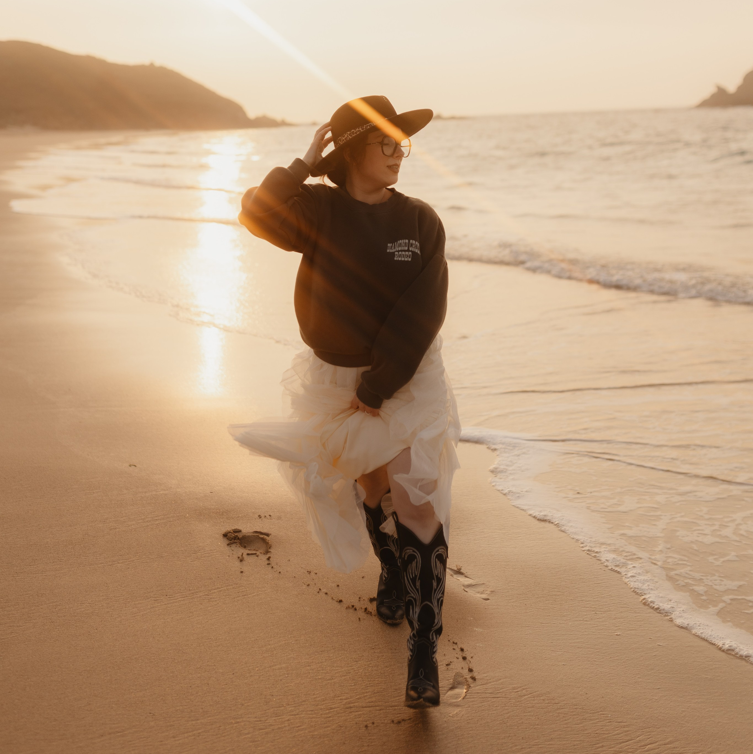 grossesse photoshoot au couché de soleil 