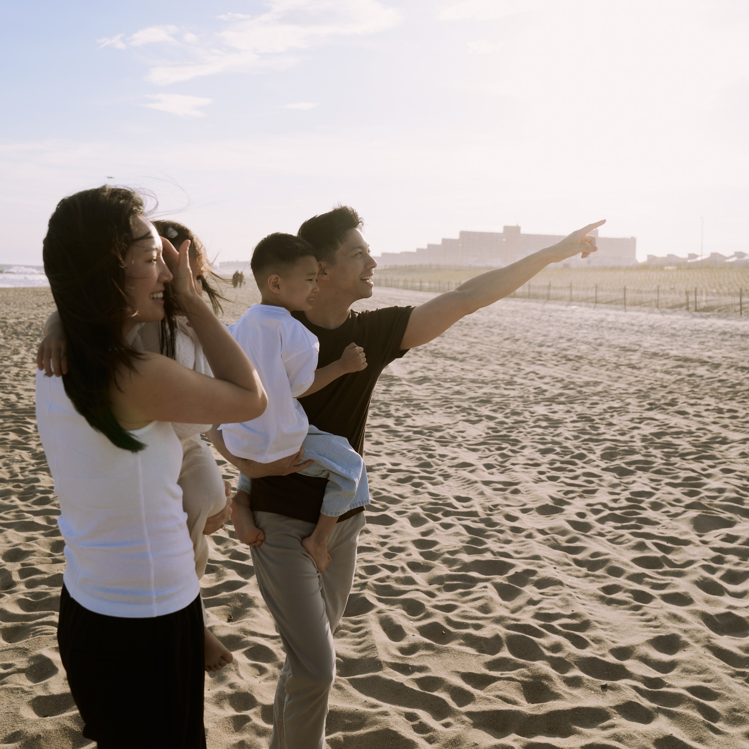 A sunset family session on the beach in Queens, New York