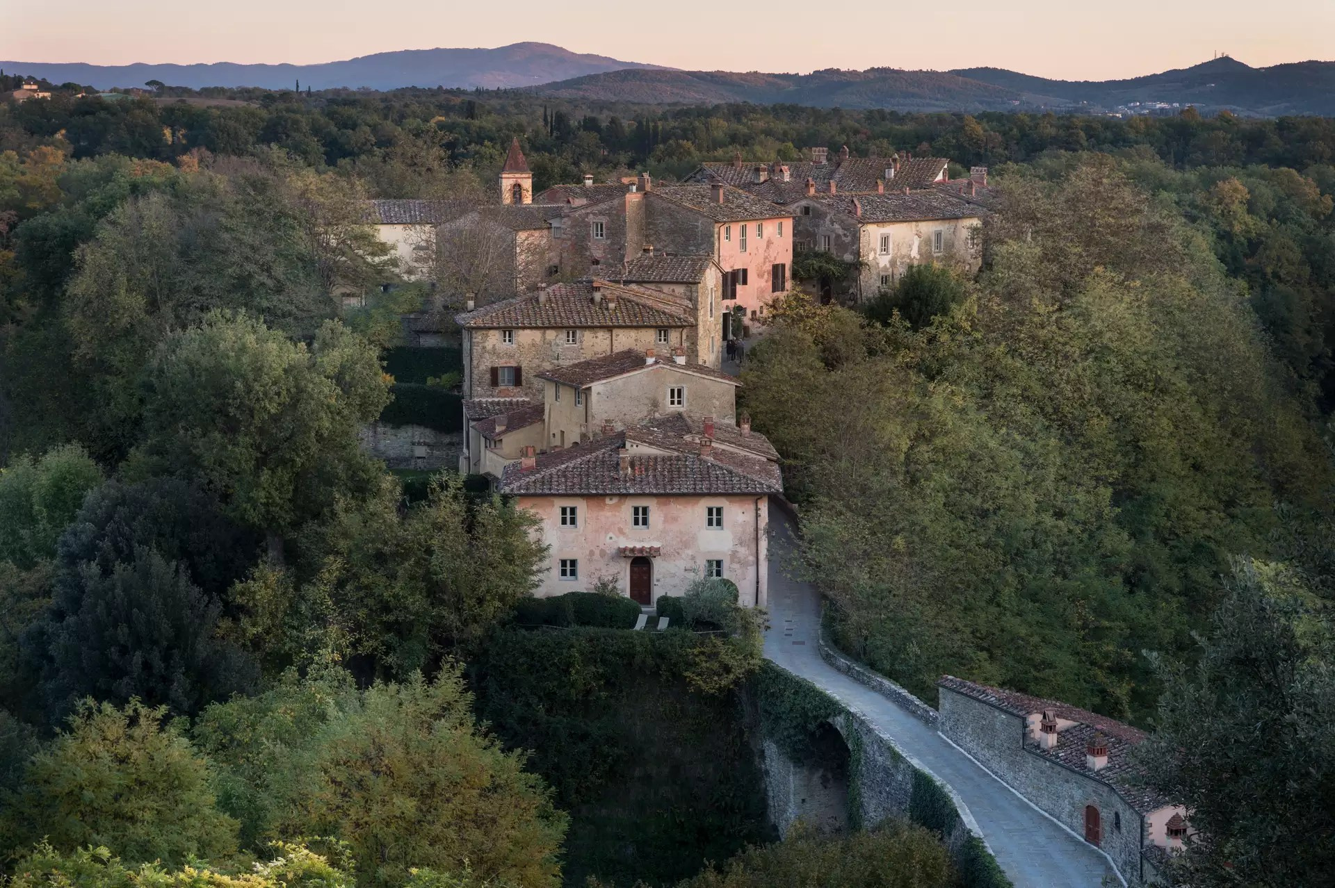 Il Borro estate vineyard views at golden hour, exclusive hire wedding venue Tuscany
