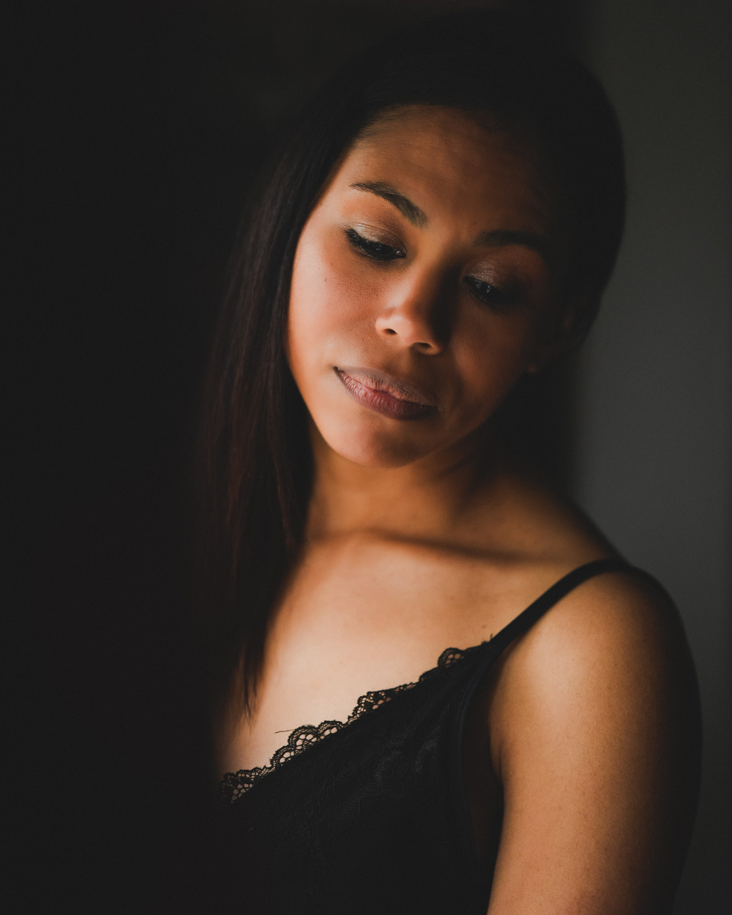 Fine art personal portrait of a woman in soft natural light, intimate and calm portrait photography in Solihull.