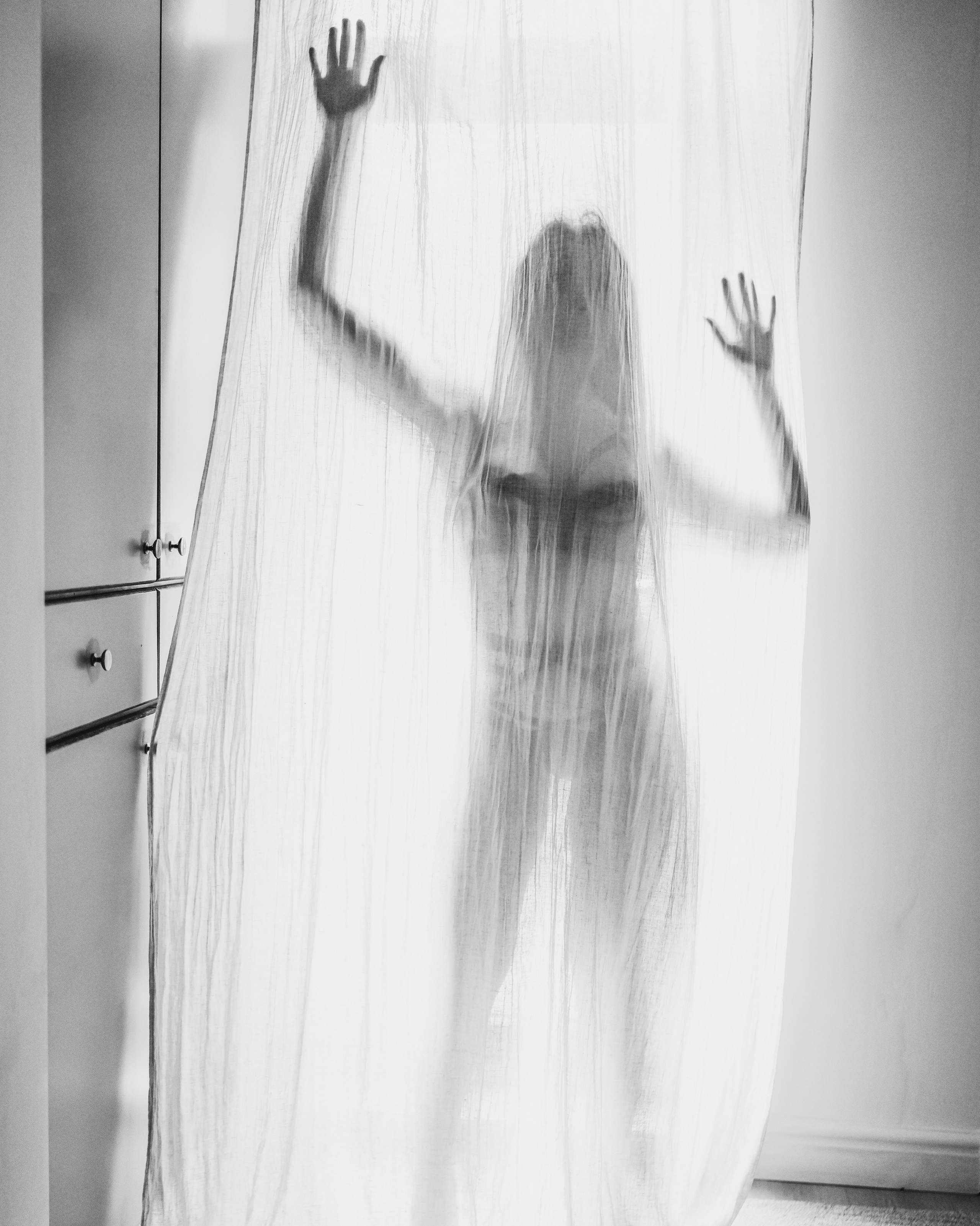 Soft boudoir photography West Midlands, woman in white natural light portrait