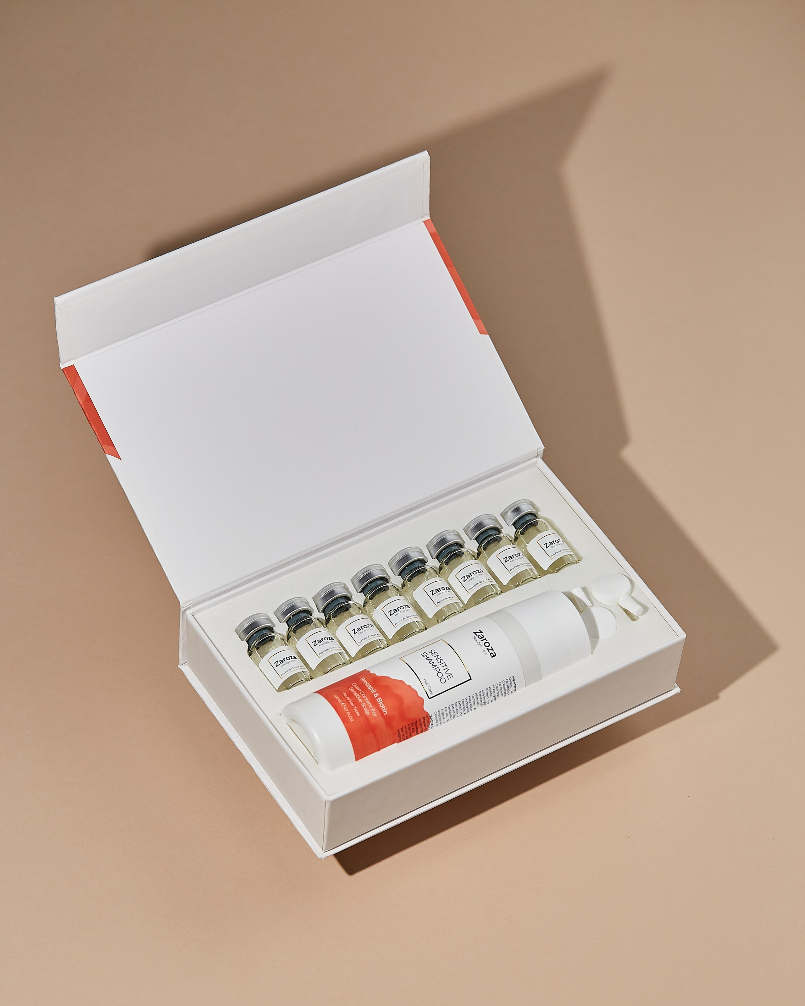 Minimalist və harmonik pastel fonda vizual olaraq cazibədar kosmetik məhsullar