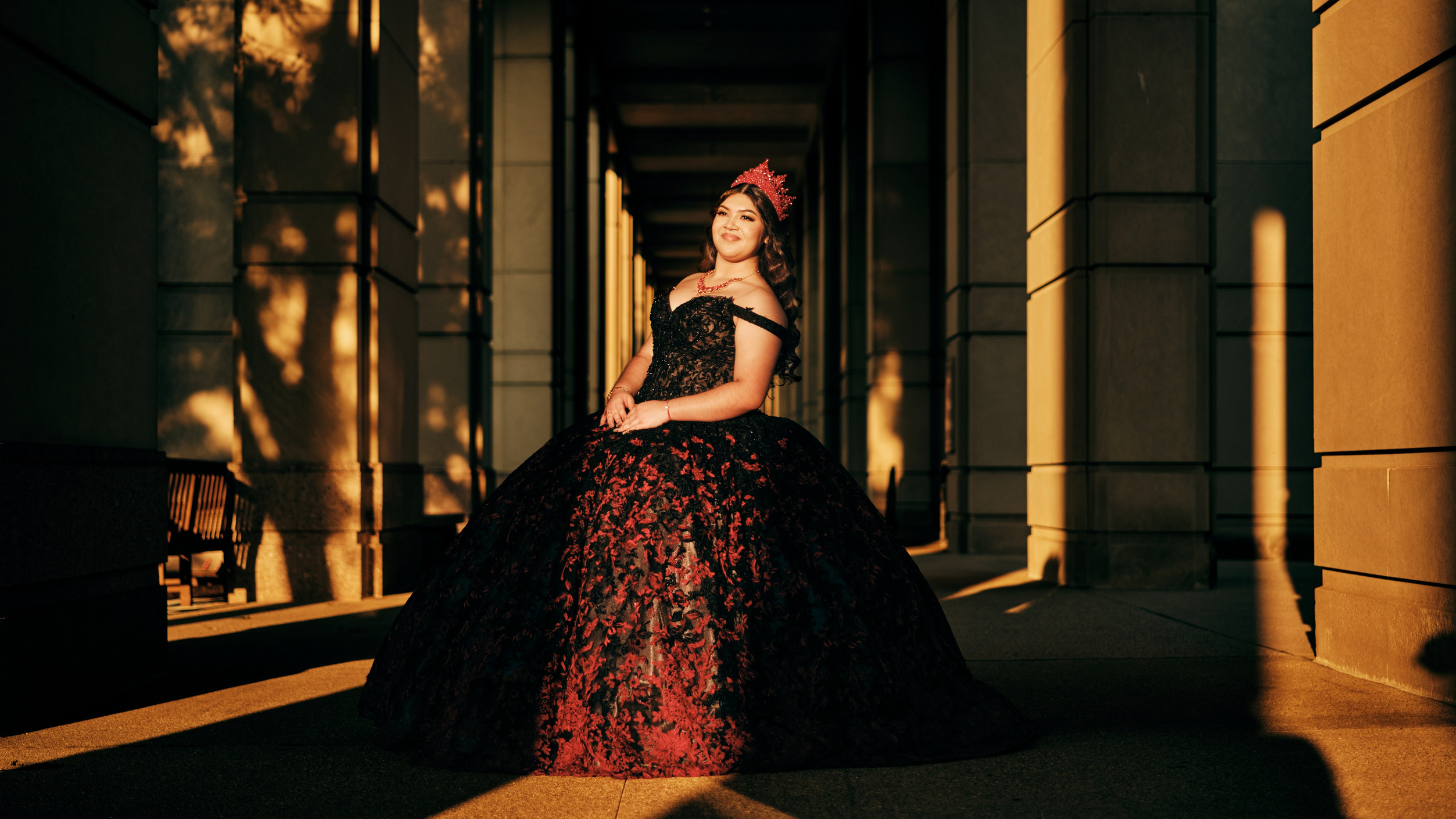 Cinematic fine art quinceañera portrait with dramatic lighting at Indiana Statehouse in Indianapolis