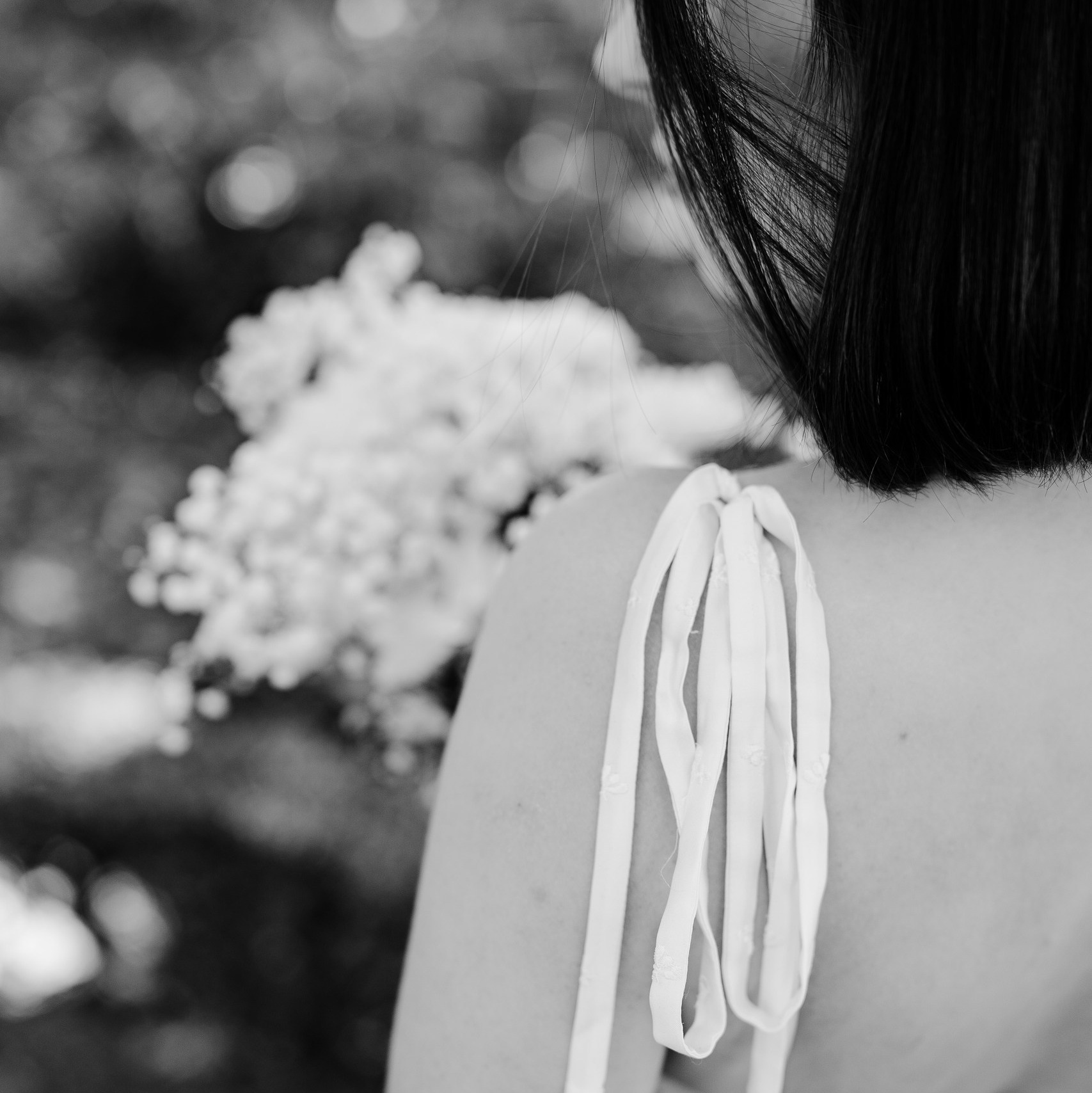 Girl in Japanese garden in Kyoto, Japan.
