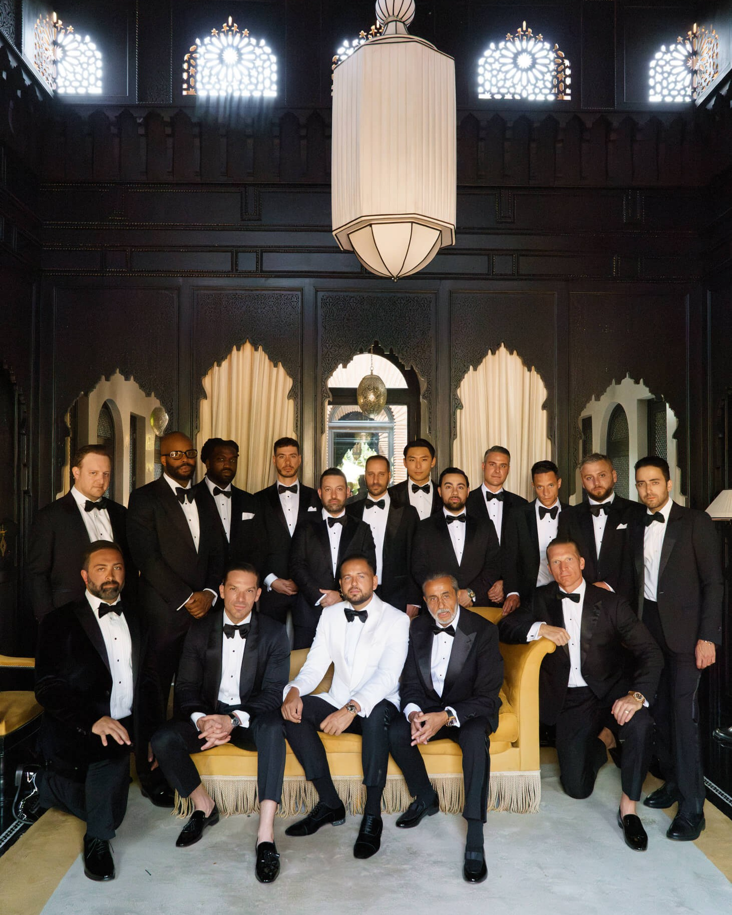 Groom and groomsmen posing in a luxury interior at Selman Marrakech before the wedding ceremony