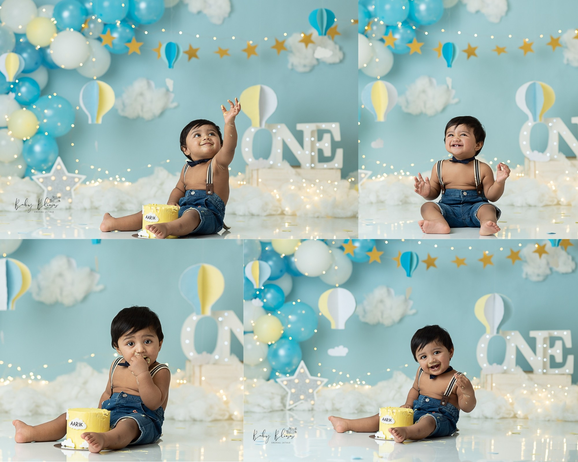 one year old little boy smiling and eating yellow cake, with yellow and blue background decor for cake smash photo shoot.