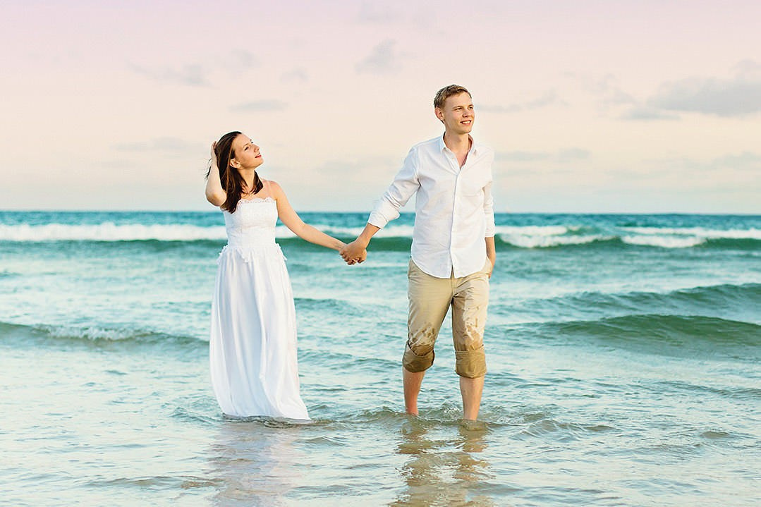 Romantic beach stroll during golden hour in Diani, Kenya. Maiafreia Studio transforms honeymoon and destination wedding moments into eternal memories.
