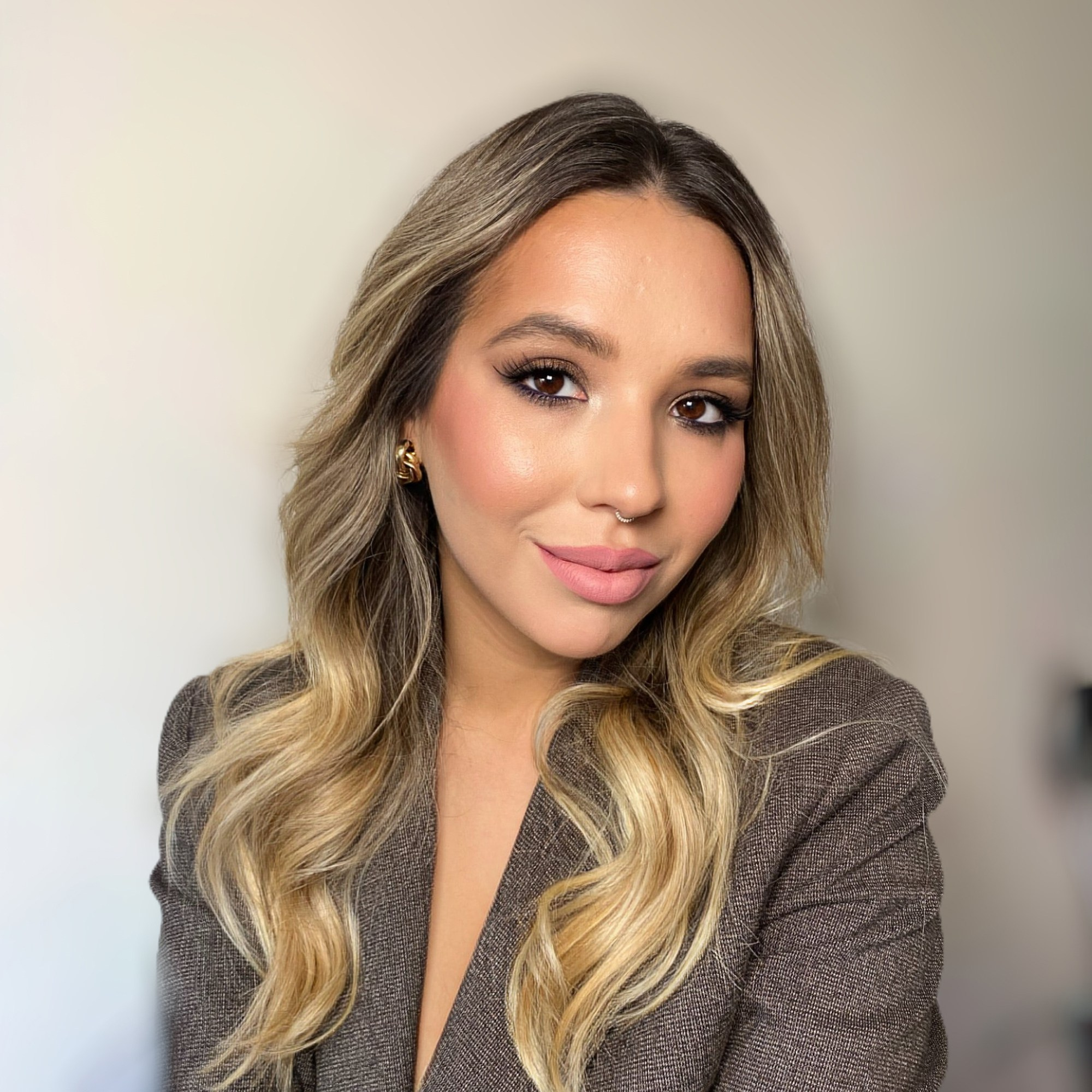 a profile of a girl in a black dress from zara with blond straight hair