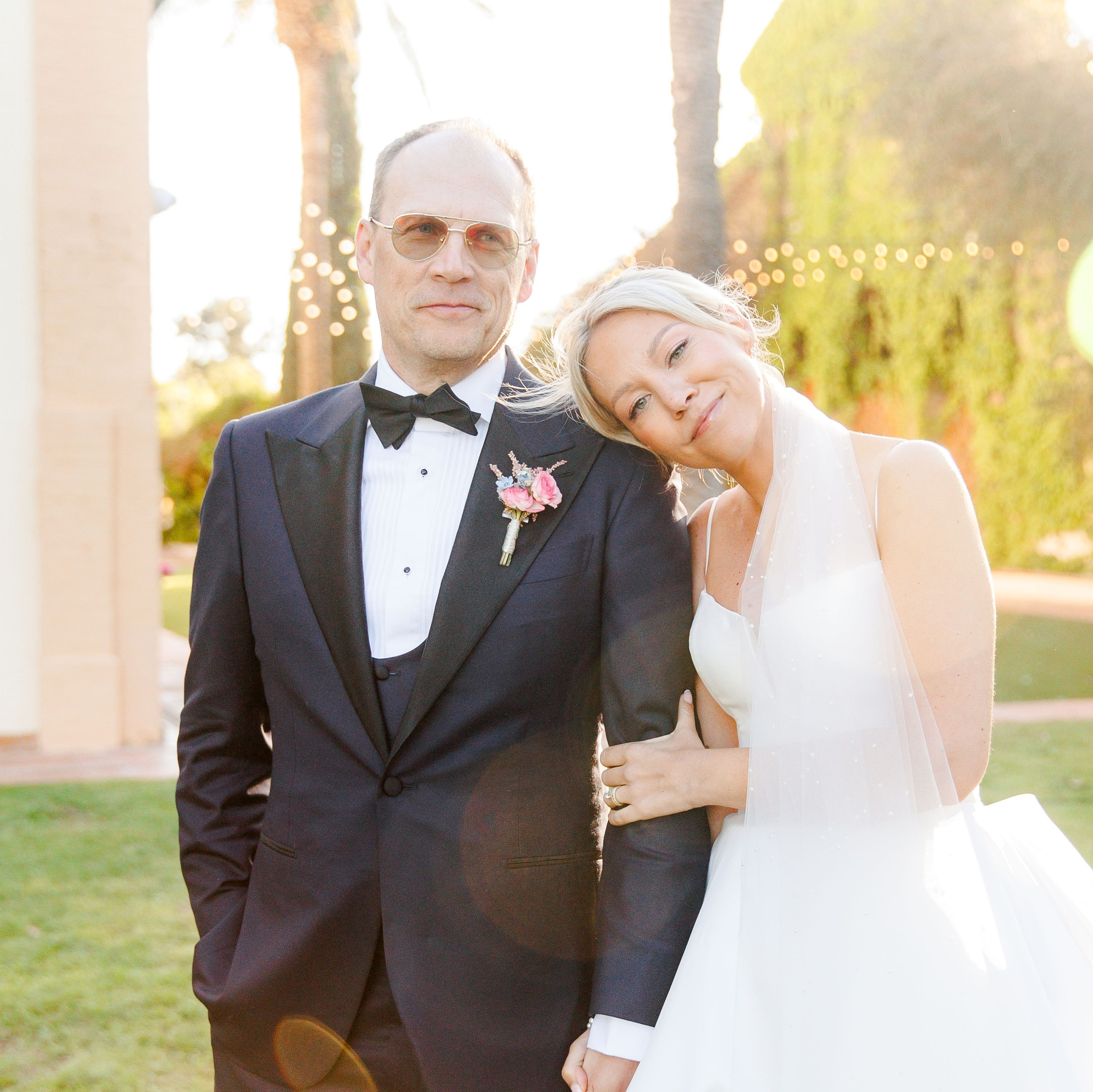 The groom and bride share the intimate moment during the golden hour shoot during their Barcelona destination wedding