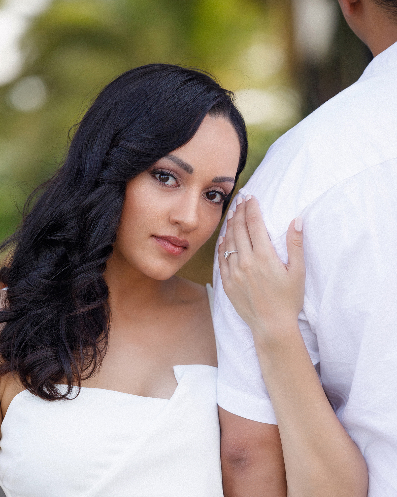Maspalomas Gran Canaria Photographer A man and woman are posing for an engagement photo.
