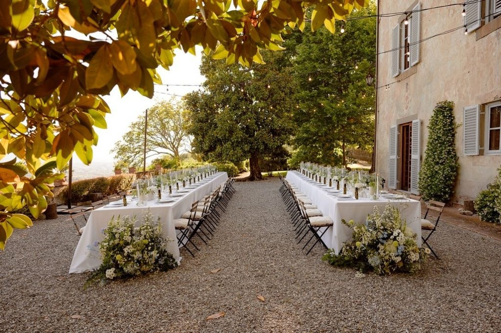 Outdoor wedding ceremony under ancient plane trees at Fattoria Mansi Bernardini, Lucca Tuscany