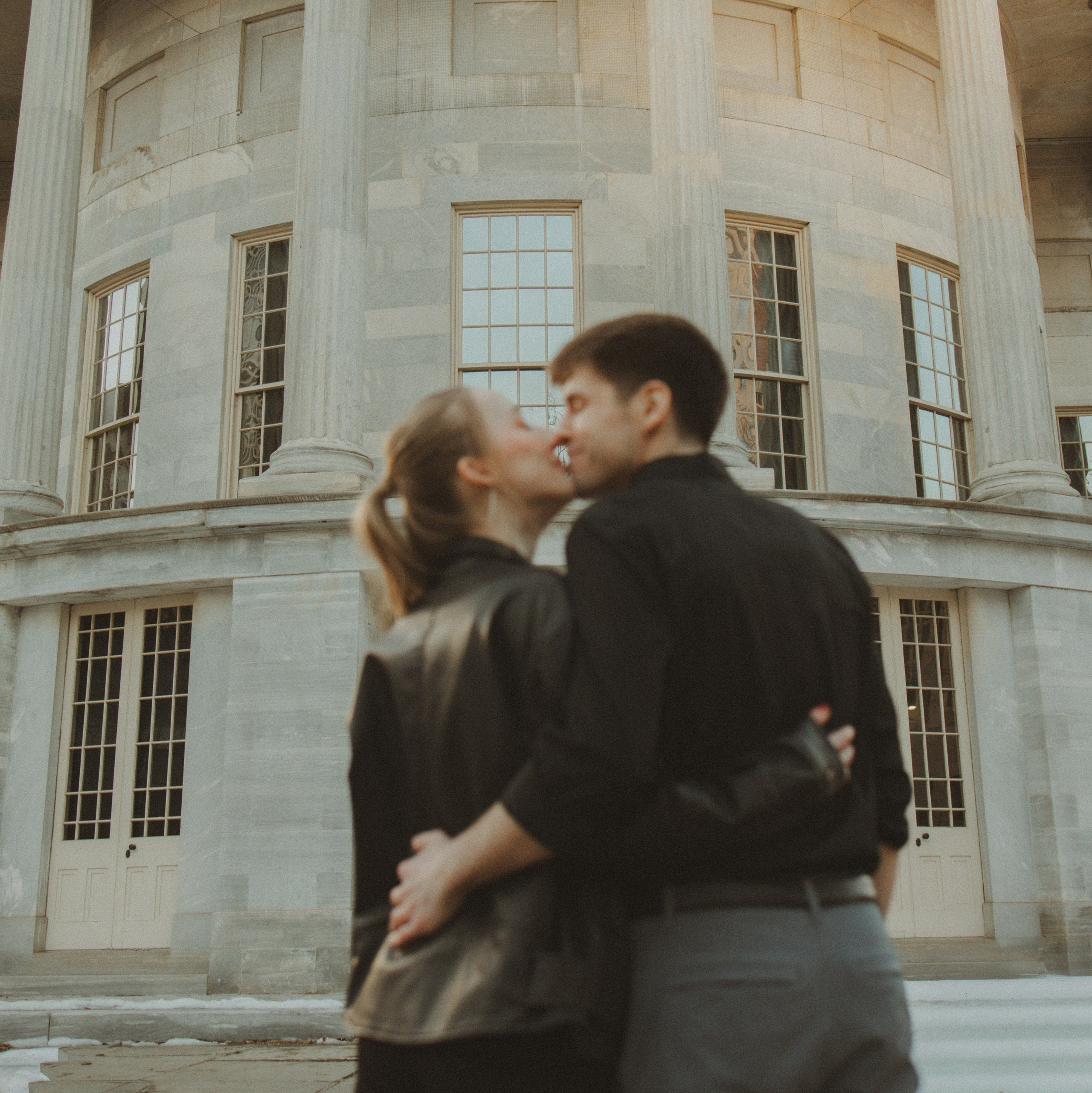 Surprise marriage proposal celebration – she said yes! Happy couple embracing after the perfect proposal