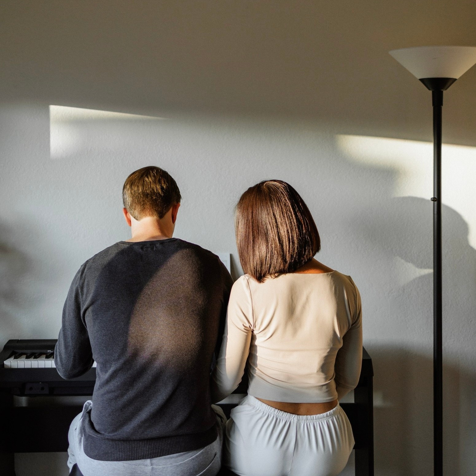 Intimate candid moment between couple at home in Orange County
