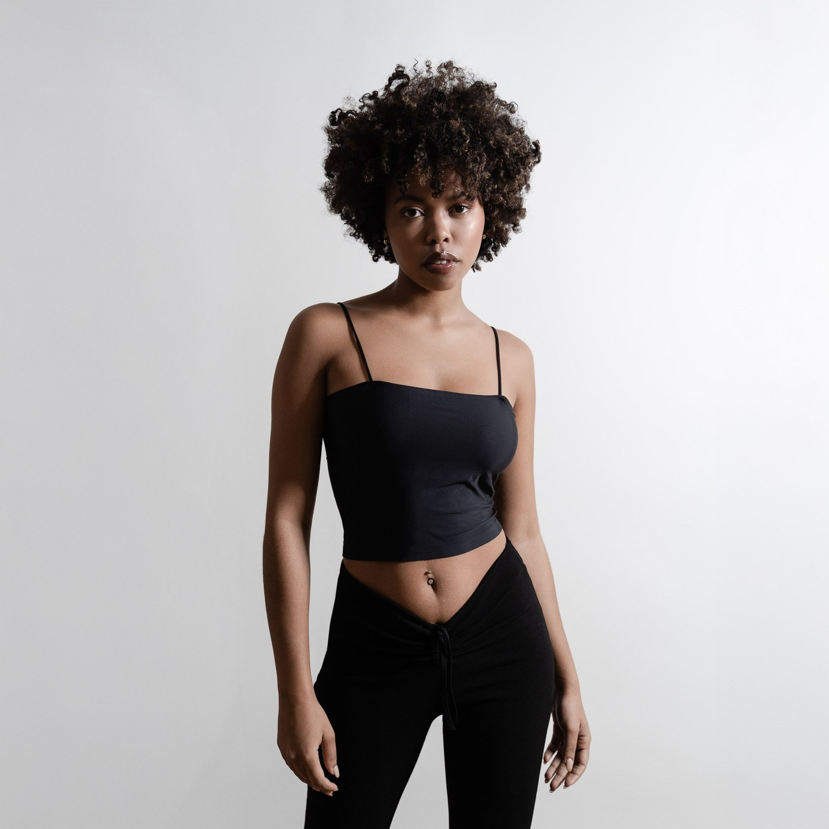 Studio portrait with natural light and clean background