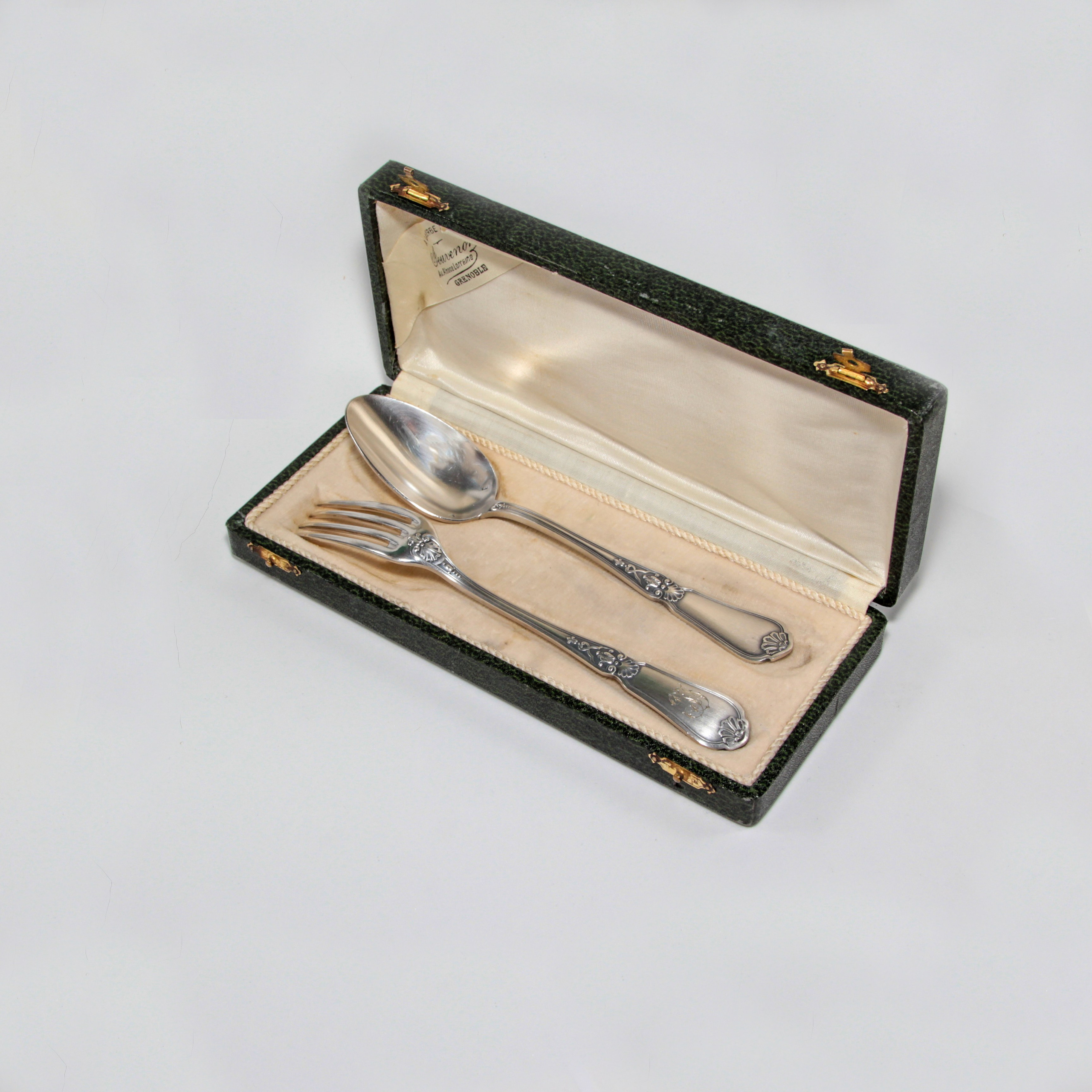 Cutlery "Egoist"A pair of antique cutlery in the original box. Silvering.