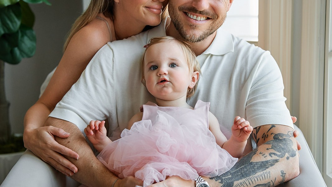 Bride and groom wedding portrait in front of historic mansion and vintage car in New York