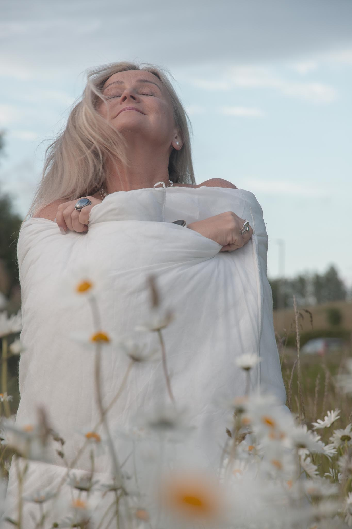 Wrap yourself portrait photography session in Eastbourne, emotional and intimate photoshoot with blankets, authentic connection