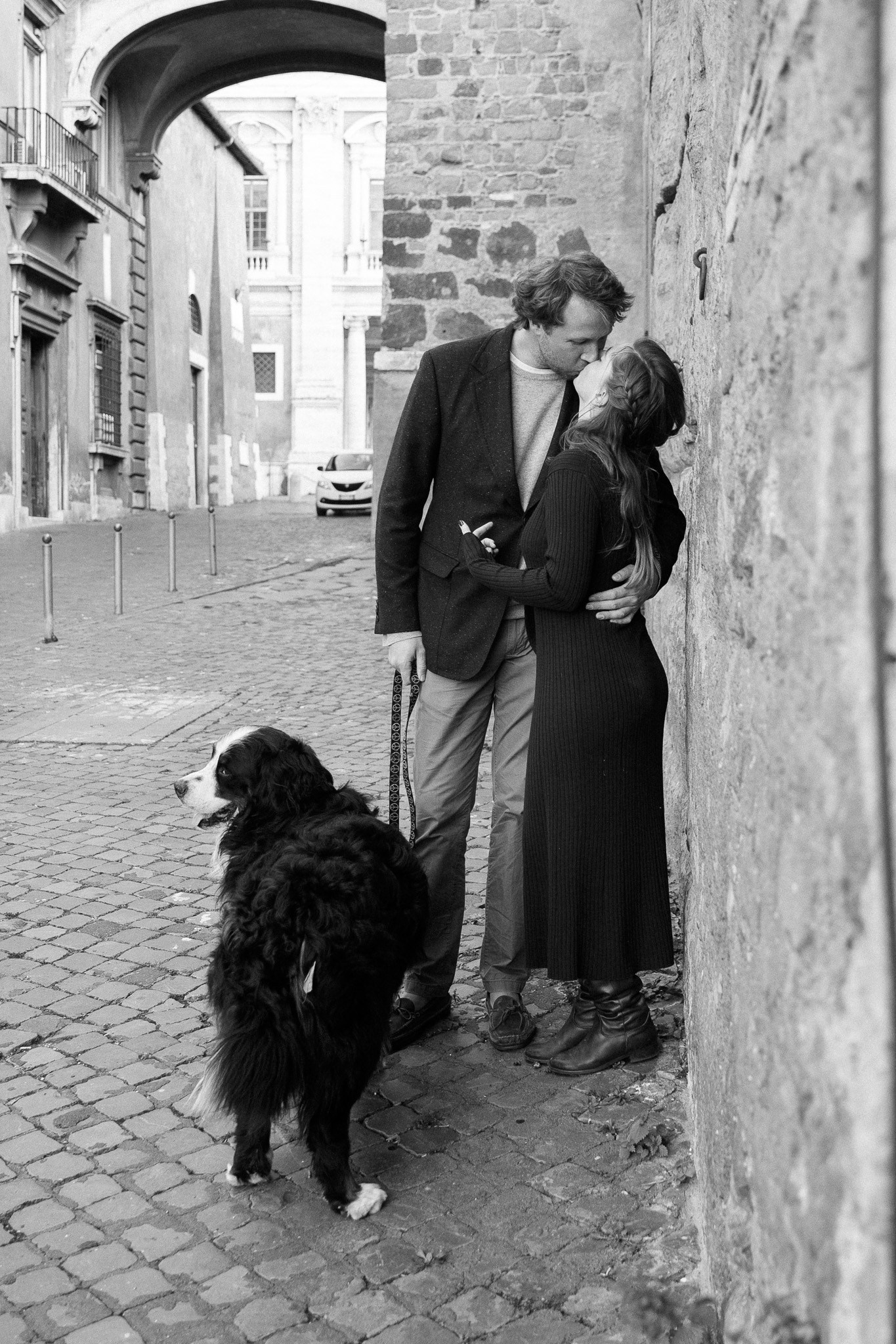 A couple dressed elegantly for their pre-wedding shoot, blending effortlessly with Rome’s timeless aesthetic.