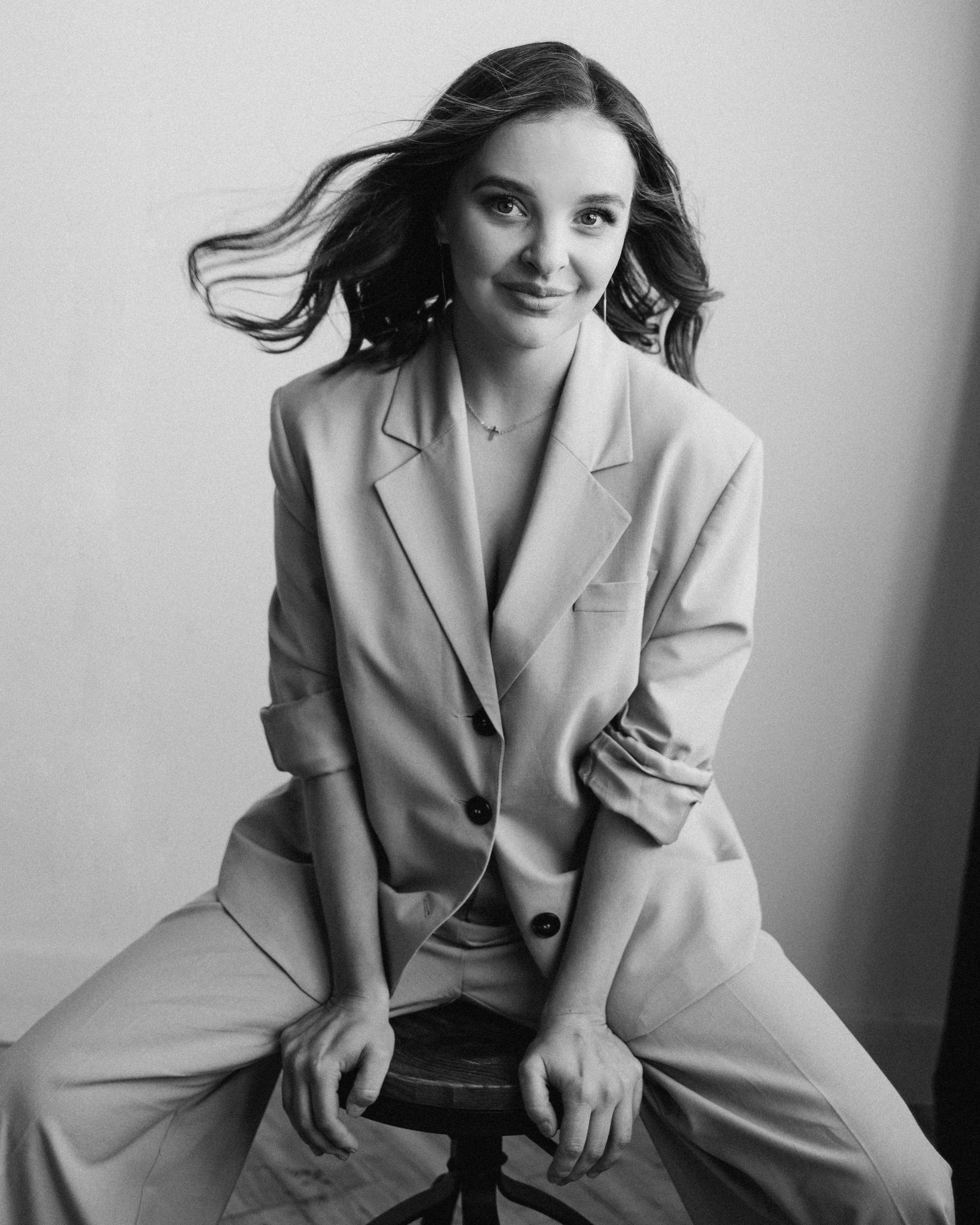 Black and white portrait of Iana Palkina, founder of Iana Banana Newborn Photography in Toronto — professional and artistic branding photo for top Toronto newborn photographer.