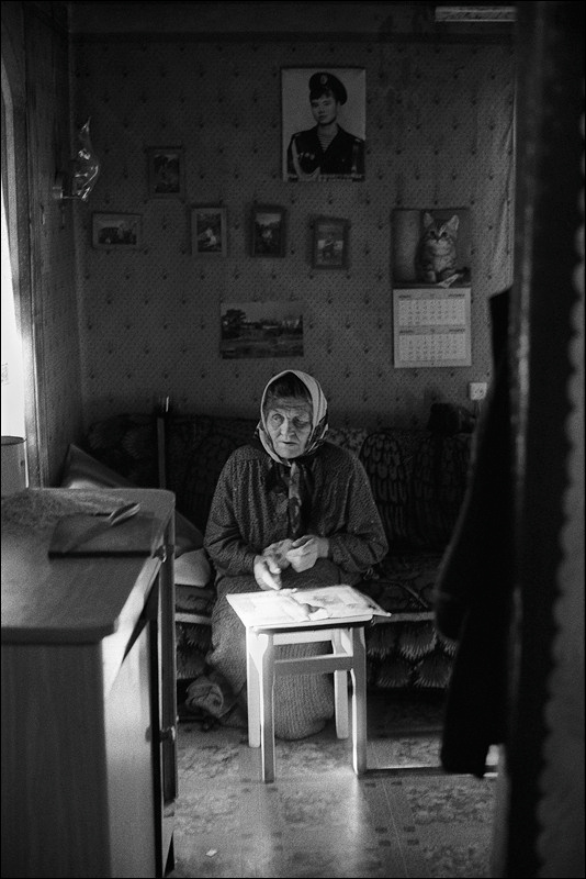 "Against the background of a photo with his grandson", farm of Senshin, village of Oblivskaya district, Rostov-on-Don region, Russia, May 2011