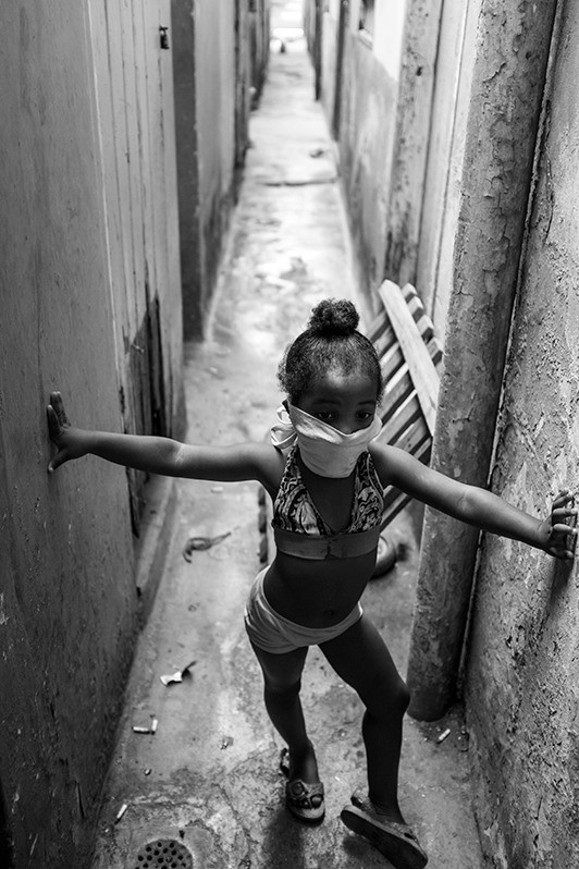 Portrait of a girl during quarantine due to the Covid-19 pandemic in the neighbourhood community of Los Sitios, Centro Habana district, Havana, Cuba. 2020