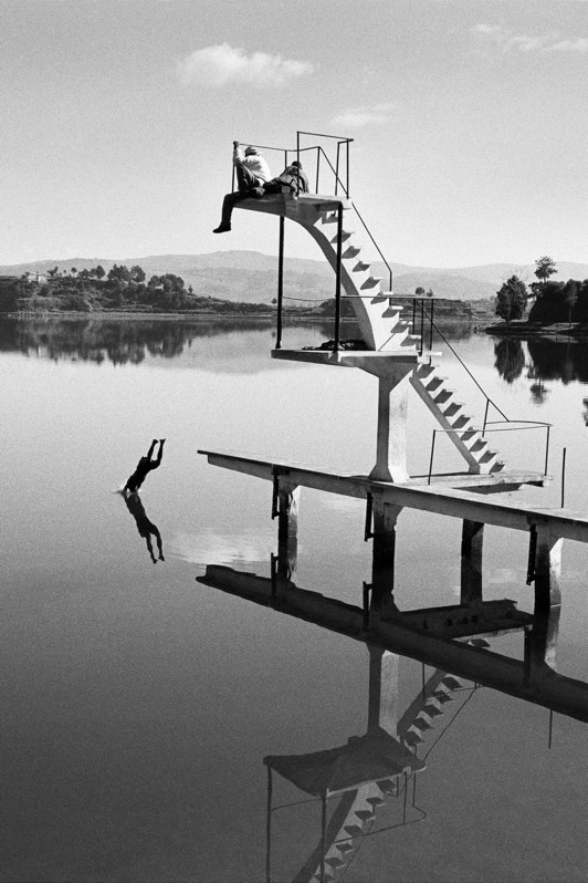 Diving board and reflection, a holiday destination, Lake Andraikiba, Antsirabe I district, Vakinankaratra region, Antananarivo province, Republic of Madagascar. 1998