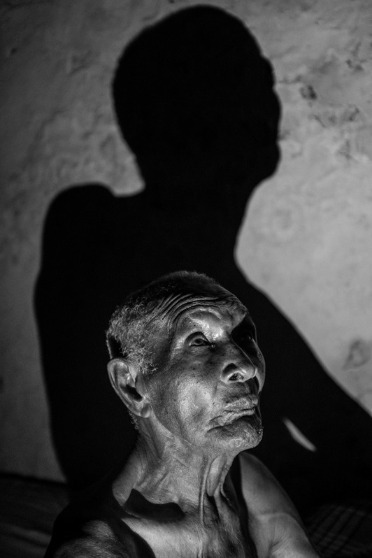 Portrait of an elderly man who lived most of his life in a shelter on Neptuno street, Centro Habana district, Havana, Cuba. 2020