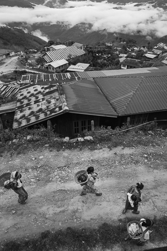 Chin people going to work in the fields in the Lautu region, Khuahrang, Chin state, Myanmar. September 2022