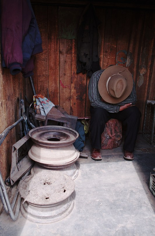 A short nap in the workshop, Mörön, Khövsgöl province, Mongolia. September 2009