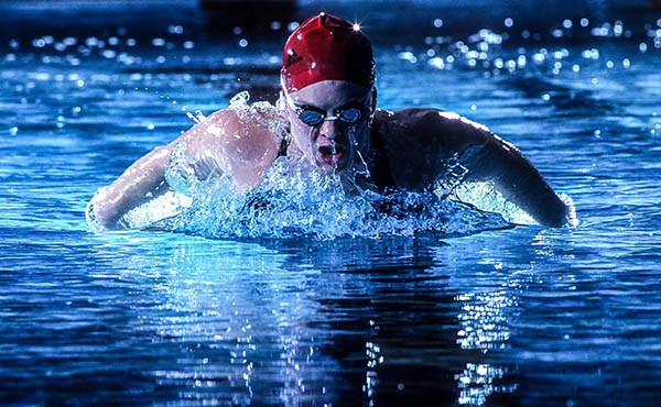 UofL swimmer in a dramatic on-location portrait.