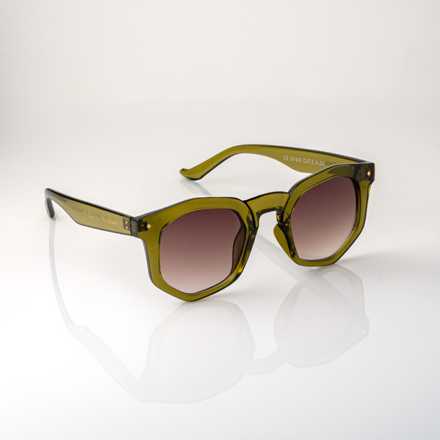 Green sunglasses on a light background