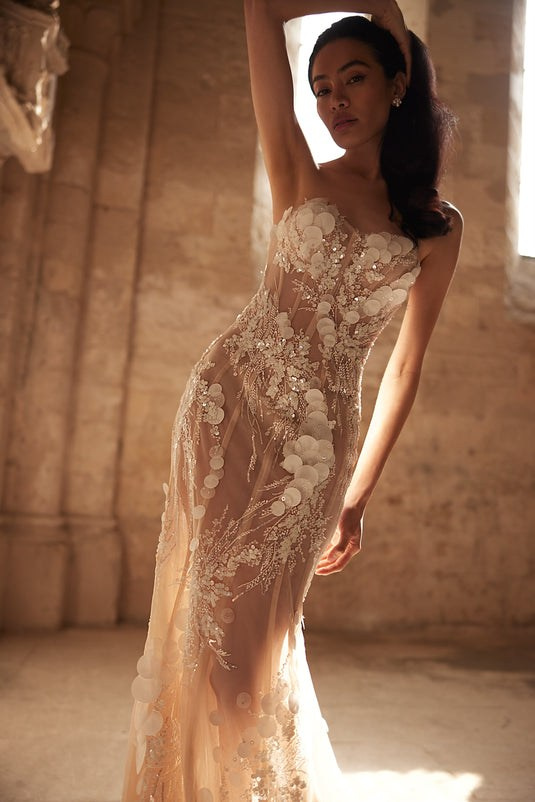 Beige wedding dress with white details 