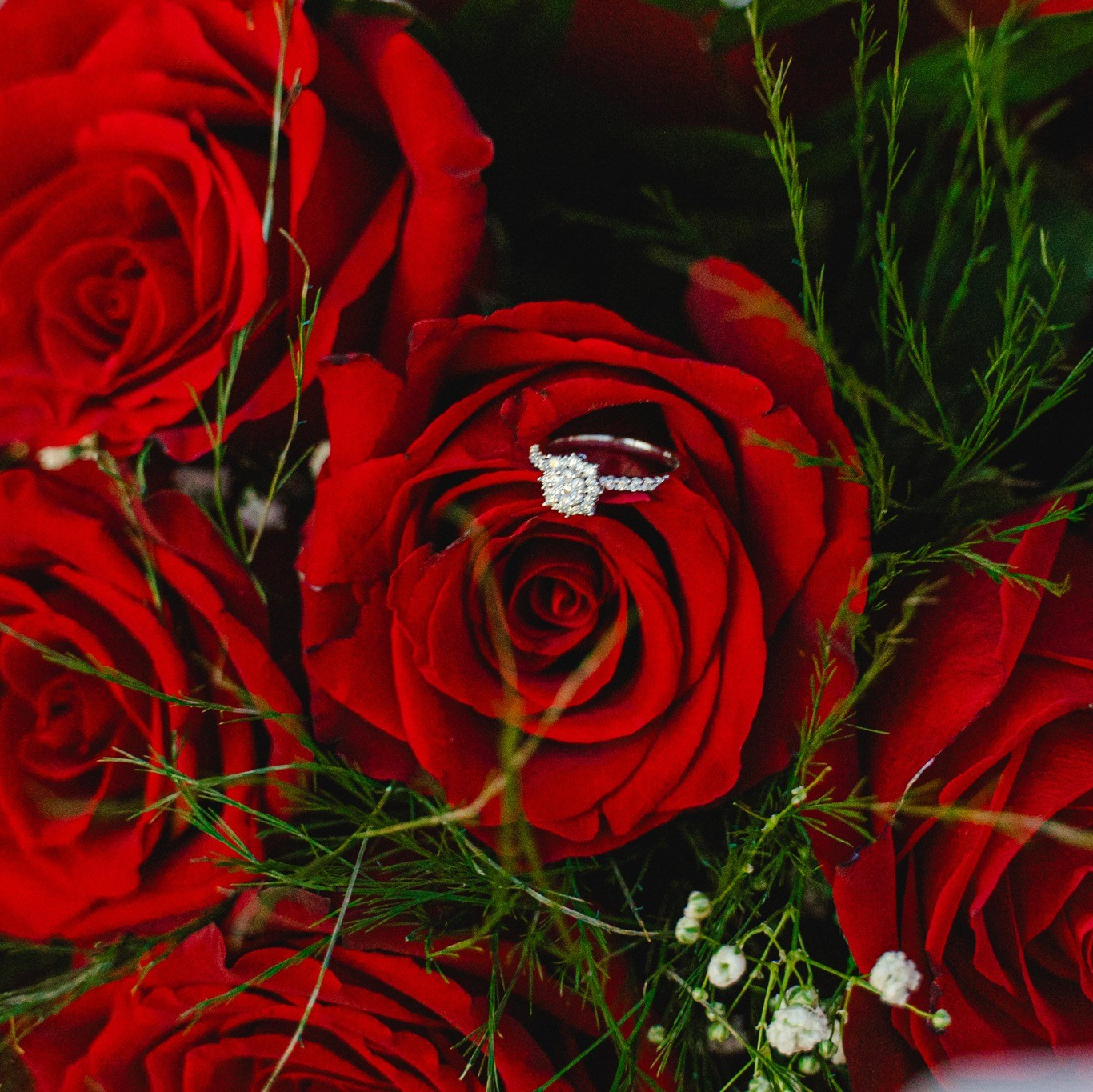 Engagement in Rhodes 💍 engaged couple sitting after the proposal at Profitis Ilias near Faliraki overlooking the Aegean Sea in Greece.