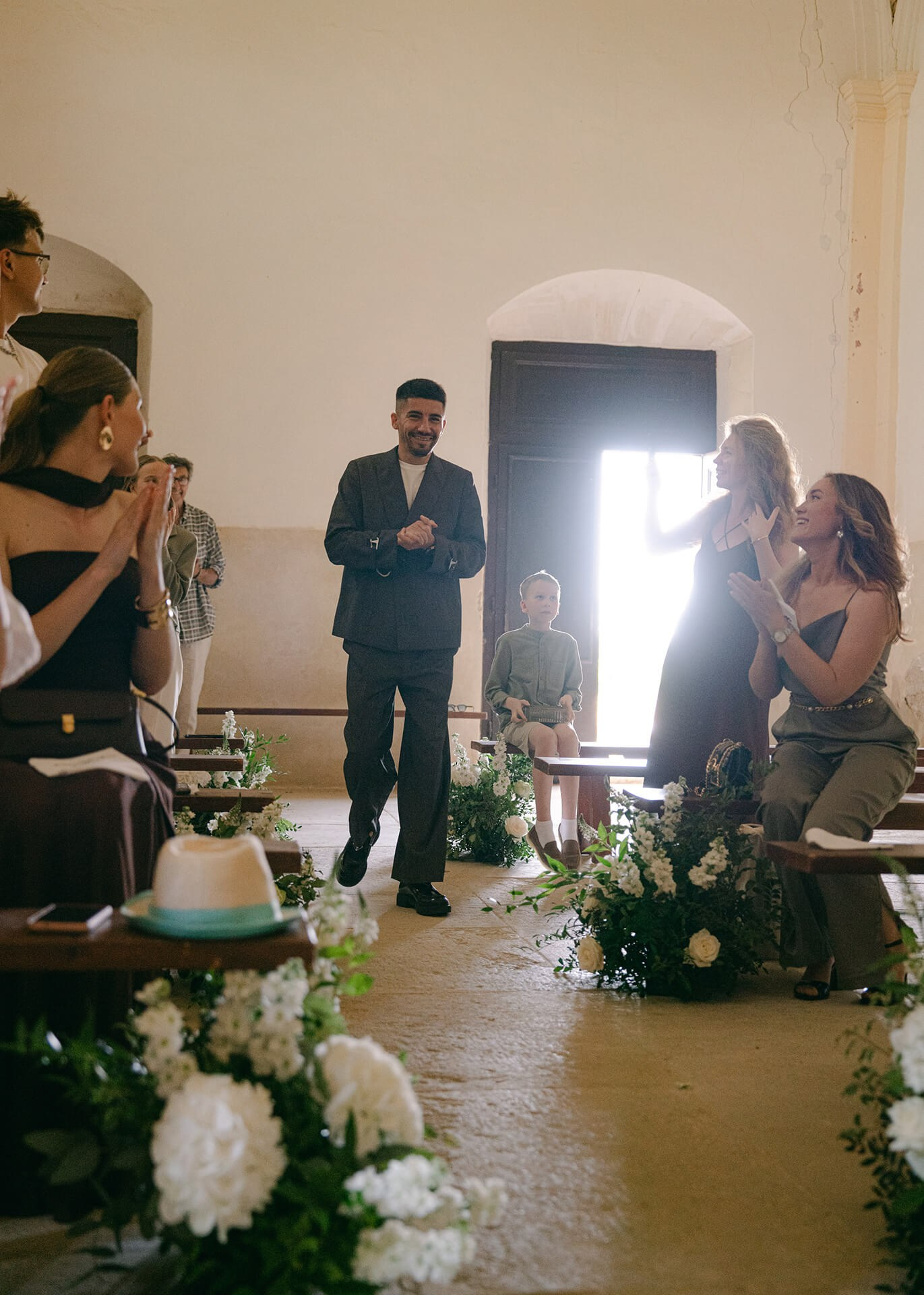 Wedding ceremony aisle with white flowers, Provence chapel photographer