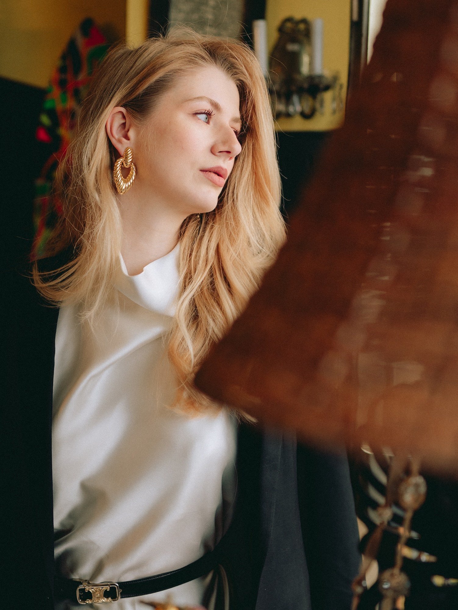 Cinematic portrait of a blonde woman in a vintage interior in Vienna
