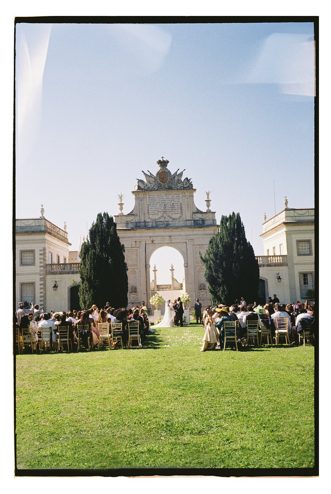 Outdoor ceremony setup on lawn during Portugal destination wedding